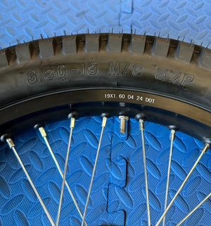 Product image of the eMOTO Surron eMoto Wheel Set featuring a Shinko 241 Dual Sport 19-inch rear wheel and tire set for e-moto bikes, shown without rotor or sprocket.