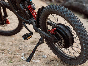 eMOTO FREEGO X2 Offroad Electric e-Moto Style eBike-Moto 3000W, rugged design, black frame, thick off-road tires, shown in outdoor setting