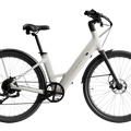Urtopia Carbon Classic Step Thru eBike in creme color, side view, showcasing lightweight carbon frame and step-through design