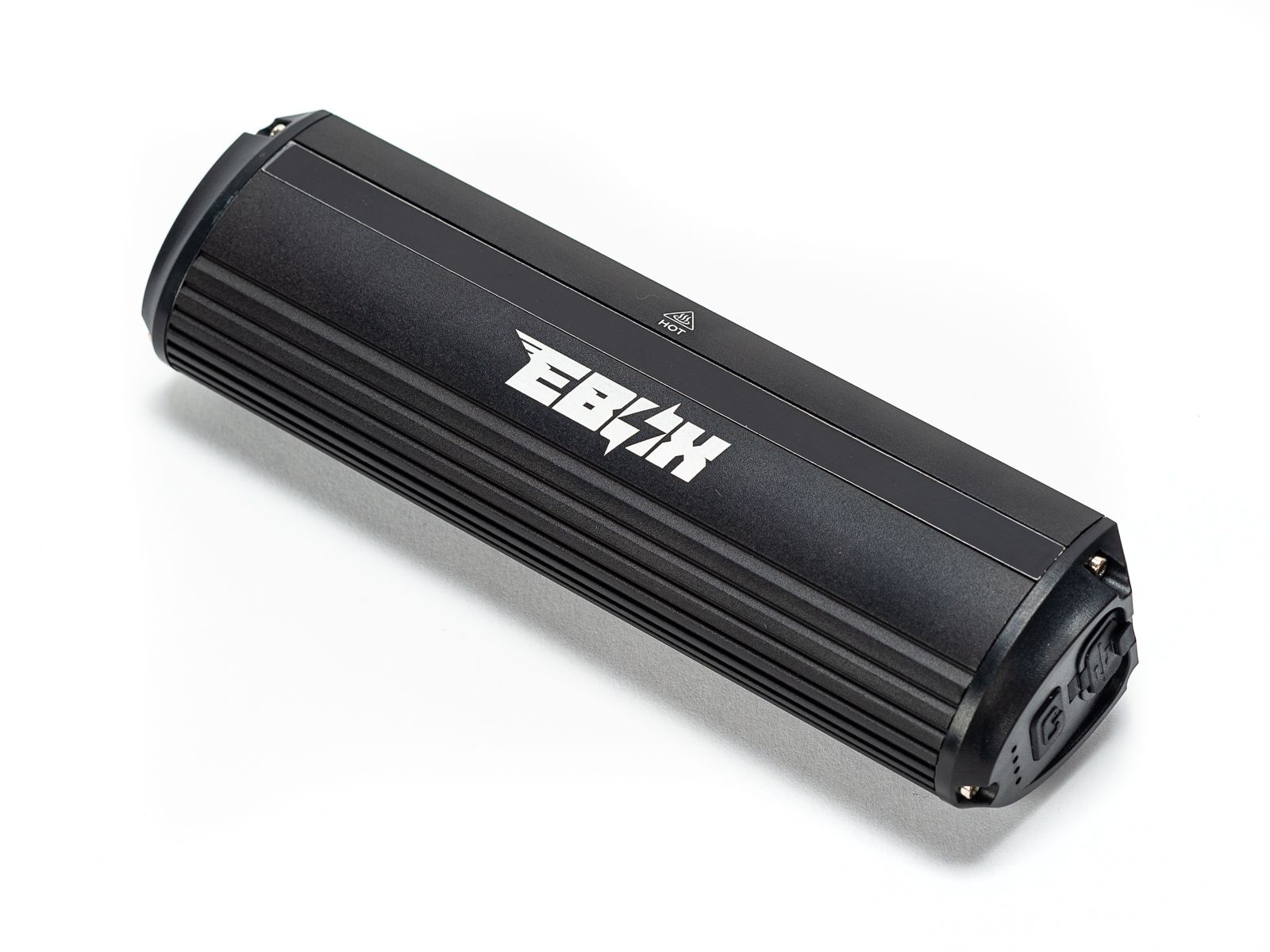 Front view of the eMOTO EBOX Dawn Headlight, showing its compact rectangular design with a clear lens and integrated mounting bracket.