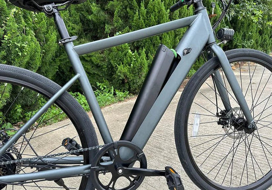 FREEGO E7 Step Over electric commuter bike, 250w motor, black frame, city background
