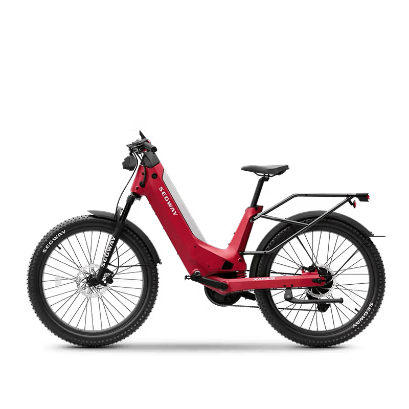 Red Segway Xafari eBike side view, showcasing its sleek frame, thick tires, and modern design against a plain background.