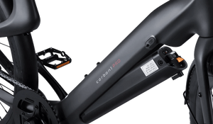 Urtopia Carbon1 Pro eBike in matte black, shown in its box with packaging, product image.