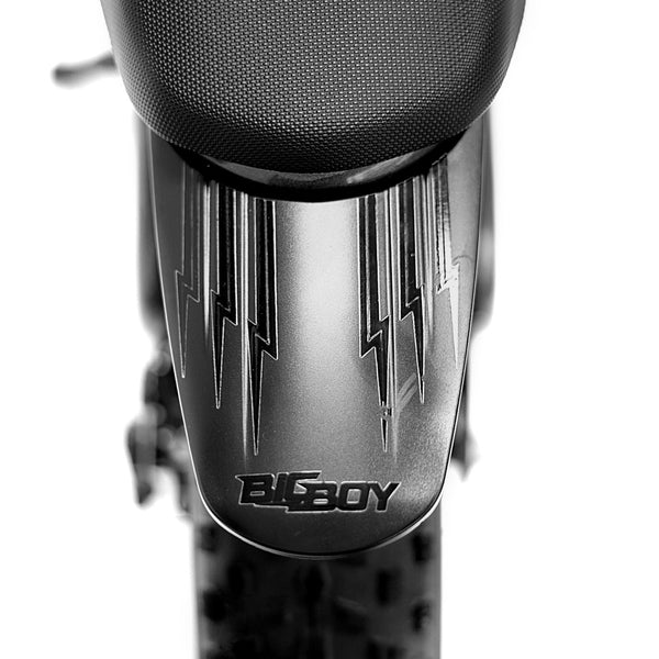 Side view of the eMOTO eBike Strike Big Boy electric bicycle, showcasing its sturdy frame, large tires, and battery pack mounted on the downtube.