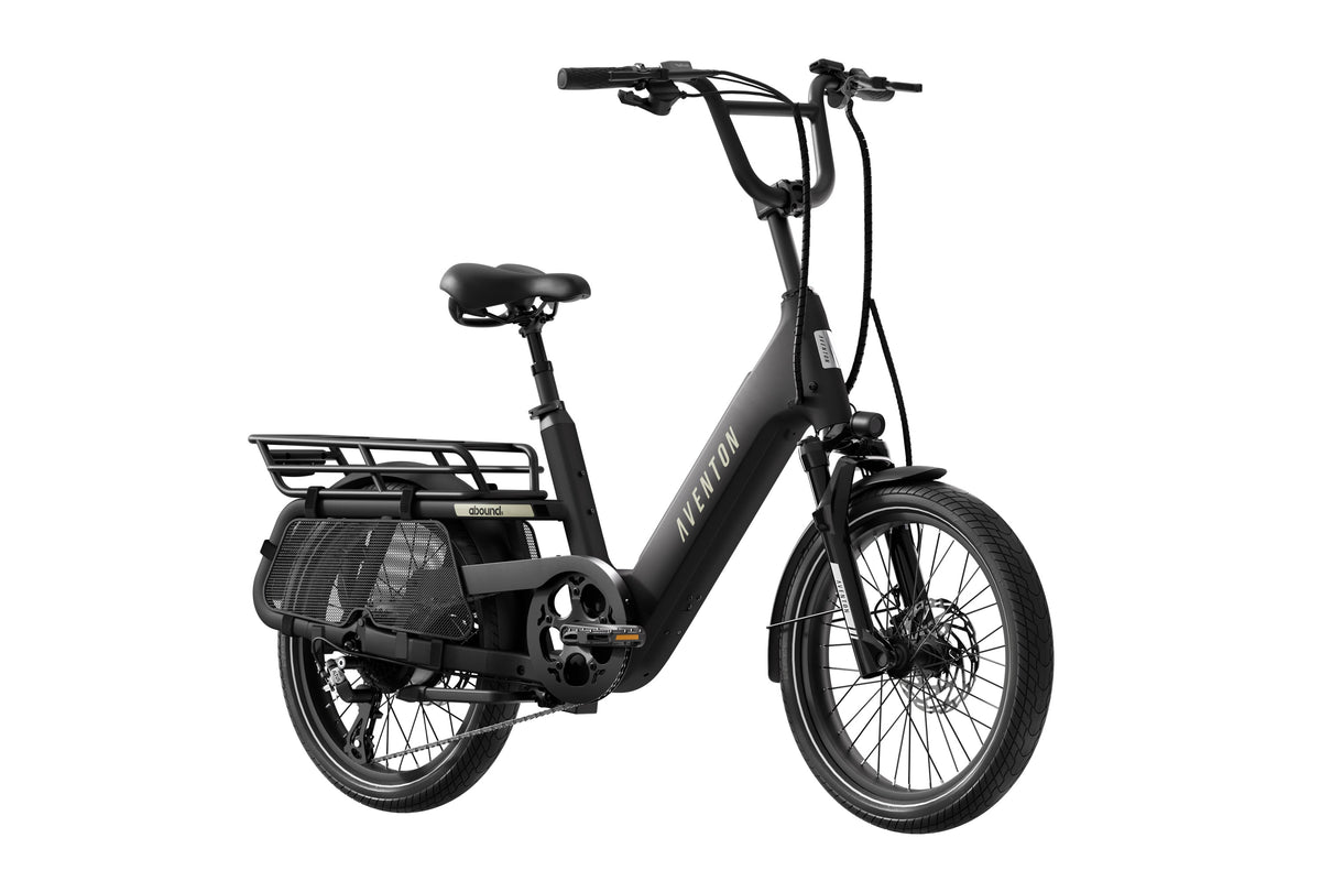Aventon Abound SR electric cargo bike in Stealth 2 color, side view, featuring rear cargo rack and step-through frame.