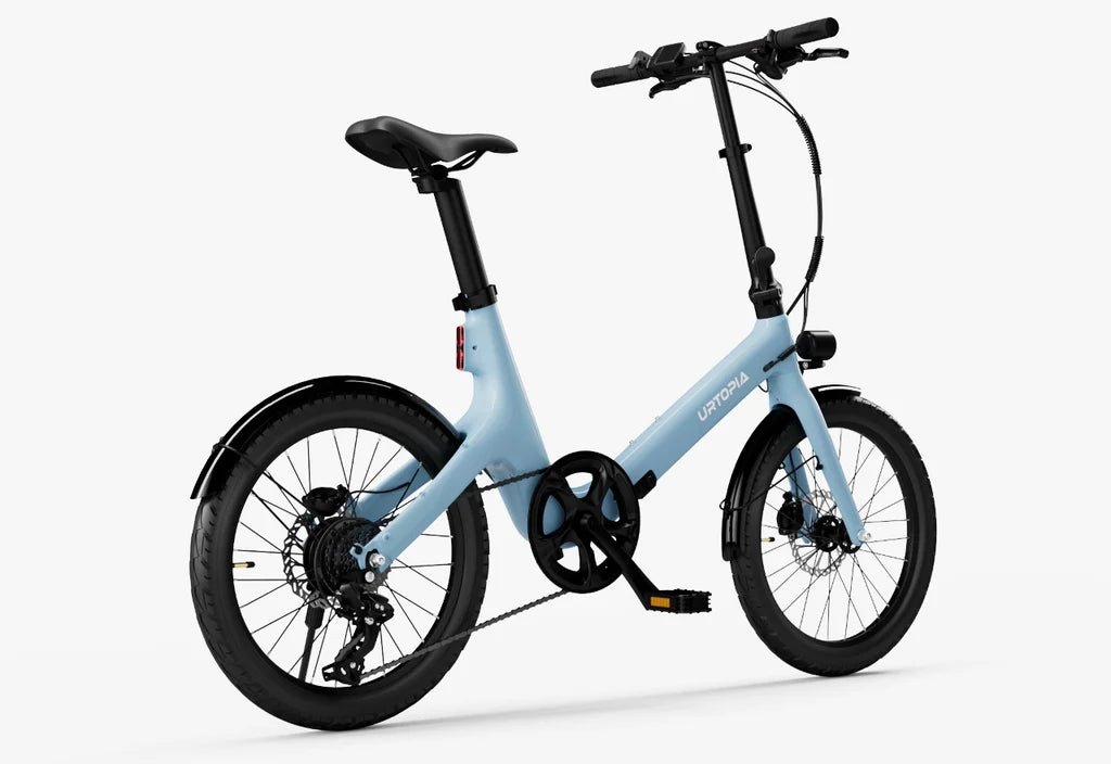 Urtopia Carbon Fold Step Thru eBike in Glacier Blue, side view, folded position, showcasing compact design and lightweight carbon frame.