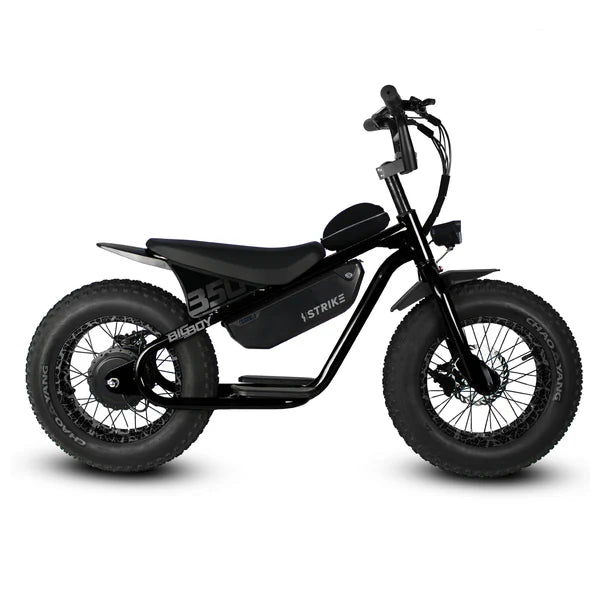 Black electric bicycle with a rugged frame, labeled "Strike Big Boy," featuring a black crackle finish, thick tires, and a sturdy rear rack.