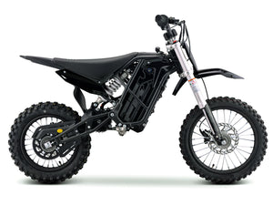 Electric dirt bike eMOTO Stomp Ebox V3 60, side view, black and green color scheme, knobby tires, sturdy frame, and visible battery compartment.
