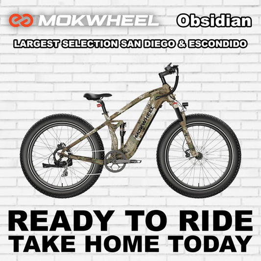 Mokwheel Obsidian eBike in Jungle Camo color, side view, displayed outdoors
