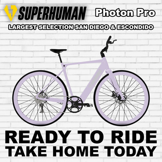 Electric bike Superhuman Photon Pro in Glowberry color, side view, displayed against a white background.