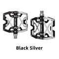 Close-up of MZYRH aluminum eBike pedals in black and silver, showing the pedal's textured surface and durable metal construction.
