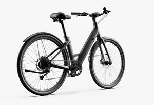 Urtopia Carbon 1 Step Thru eBike in matte black, side view highlighting the step-through frame and sleek design