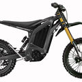 Arctic Leopard Spirit Leopard XF Pro electric bike in black, displayed in a shop setting.