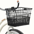 Black Retrospec Apollo steel bike basket attached to the front of an eBike