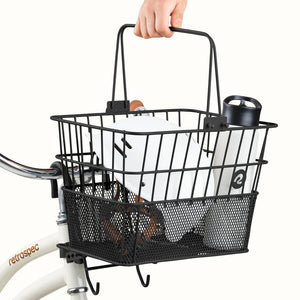 Black Retrospec Apollo steel eBike basket attached to a bicycle, product image showcasing the basket's design and structure.