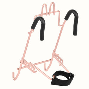 Blush pink Retrospec Apollo steel bike basket attached to an eBike