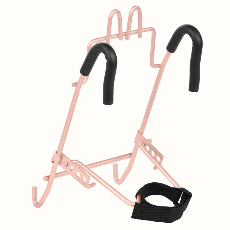 Blush pink Retrospec Apollo steel bike basket attached to an eBike