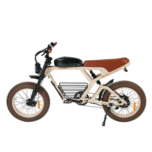 Side view of the Revi Cougar Pro eBike with a black front basket accessory attached, displayed against a white background.