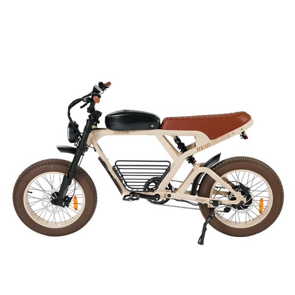 Side view of the Revi Cougar Pro eBike with a black front basket accessory attached, displayed against a white background.