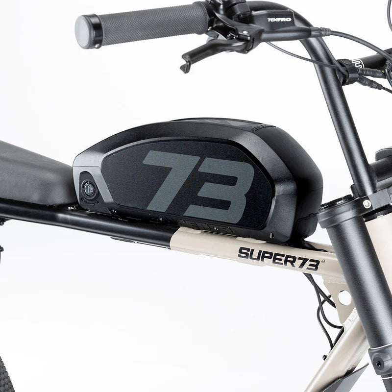 Side view of a Super73 Pro 750 eBike battery showing its sleek black casing and branding, placed on a white background.