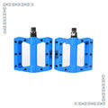 Electric blue eBike pedals with a bright, vibrant finish designed for electric bikes, product image.