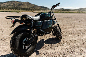 A black and red eBike Drift Hero 1500w Mini electric bike with thick tires, compact frame, and sporty design, displayed on a white background.
