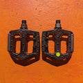 Close-up view of metal eBike pedals in Style 3, showing textured surface and sturdy construction.