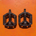 Black nylon eBike pedal with textured surface and reflective strips, Style 1, shown on a white background.