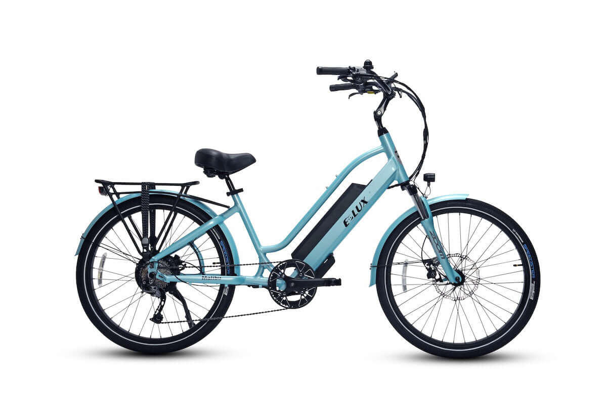 Light blue ELUX Malibu 500W Step Thru electric beach cruiser eBike with 26x2.1 street tires, shown from the side.