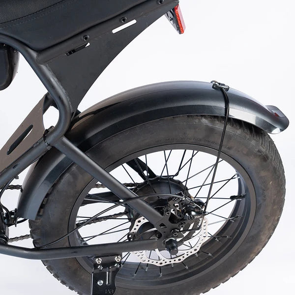 Close-up view of the Macfox X1S eBike Fender Kit installed on the rear wheel, showcasing the durable black fender and mounting hardware.