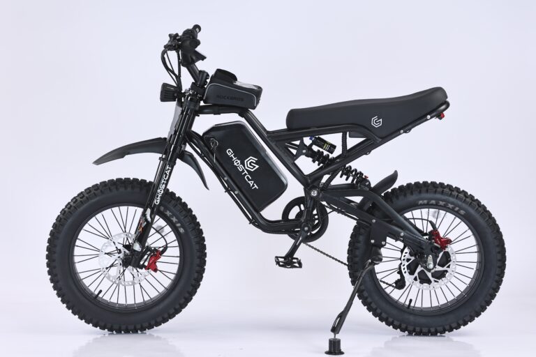 A black Ghostcat F4X Hunter eBike displayed in a dramatic blackout setting, highlighting its rugged frame and off-road tires.