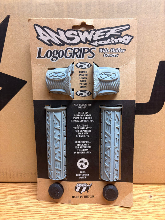 Grey Answer Racing eBike grips, textured surface, displayed on a white background.