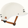 Matte eggshell Retrospec Remi eBike helmet, side view, with adjustable straps and ventilation holes