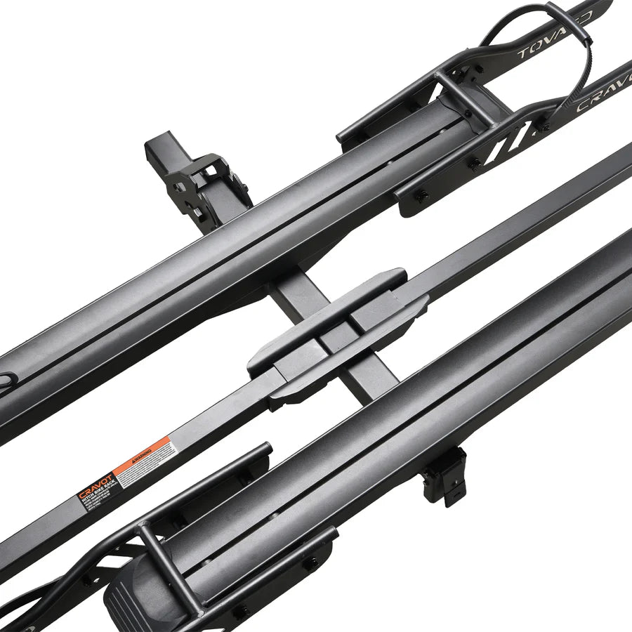 Cravot CyberRack R2 eBike hitch rack with integrated ramp accessory, shown mounted on a vehicle, holding two electric bikes securely.