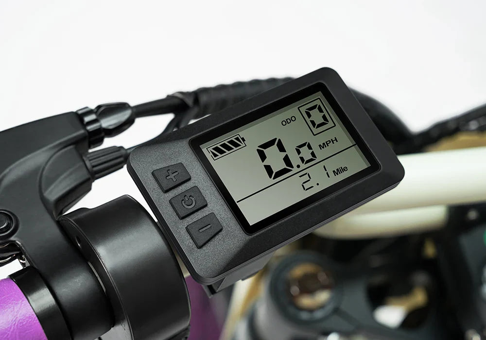 A black Macfox X1S electric bike with thick tires, front suspension, and a minimalist frame, displayed on a plain background.