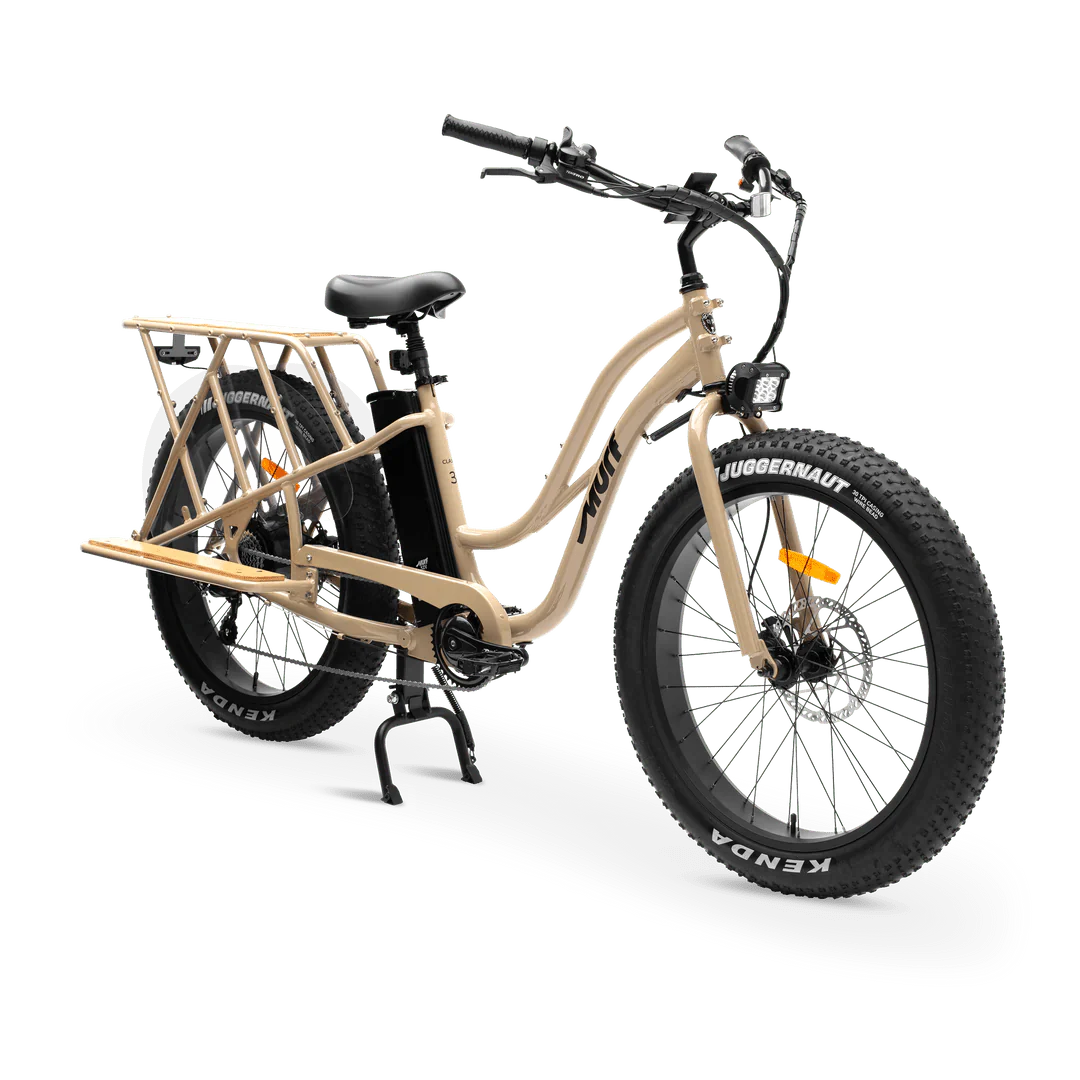 eBike MURF Alpha Cargo Fat Tire Beach Cruiser 52v in desert setting, side view, showcasing large tires and cargo rack