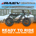 Metallic green Raev Bullet eBike parked outdoors, side view, with R2R Escondido branding visible.