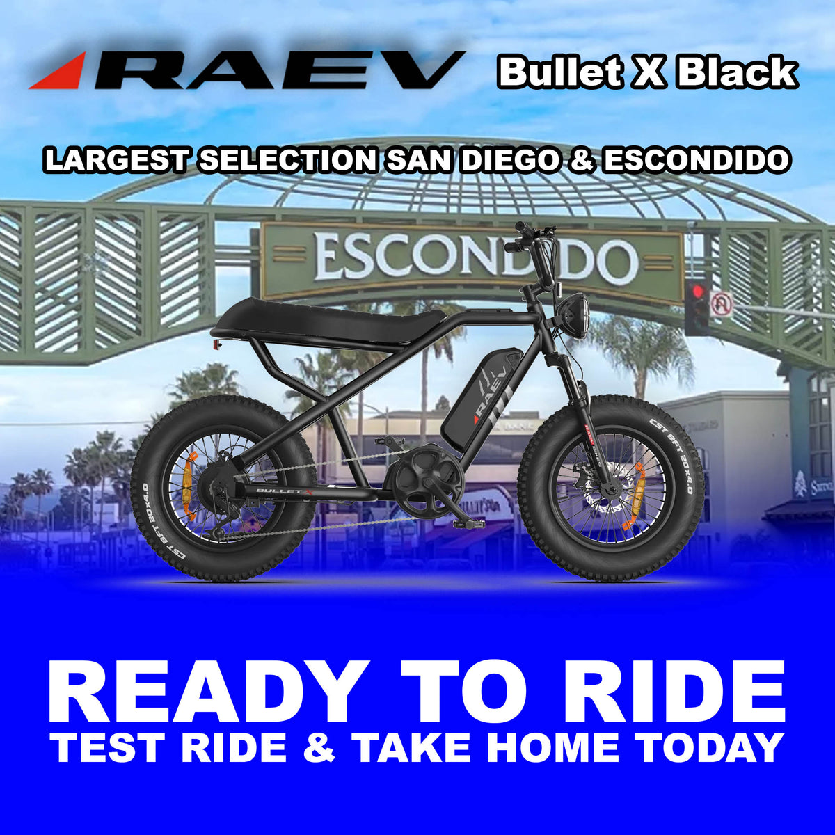 RAEV Bullet X electric bike in metallic black, side view, displayed outdoors in Escondido, with rugged tires and sleek frame design