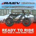 Metallic green Raev Bullet X eBike parked outdoors in Escondido, side view
