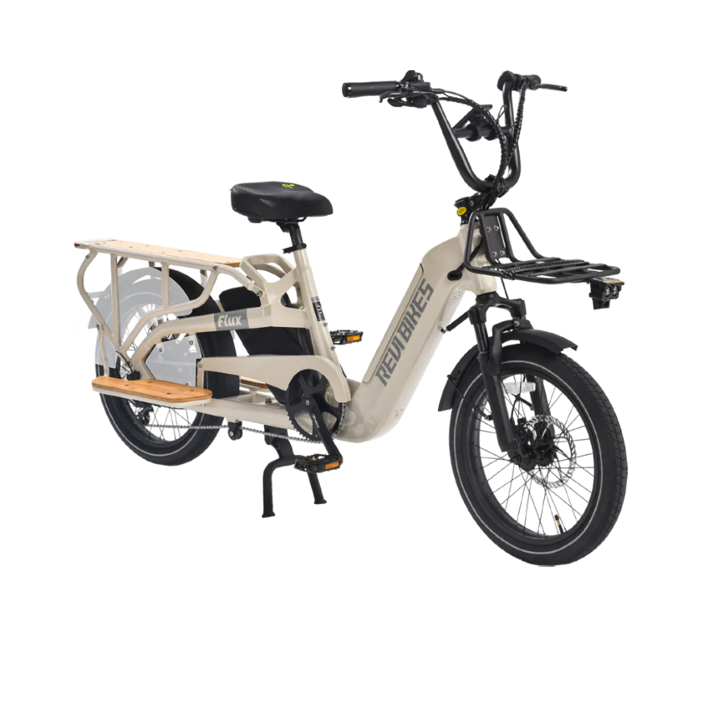 Cream-colored eBike Revi Flux electric bicycle, side view, against a plain background
