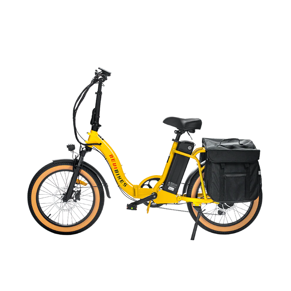 Yellow eBike Revi Rebel.2 electric bicycle side view with black tires and frame accents