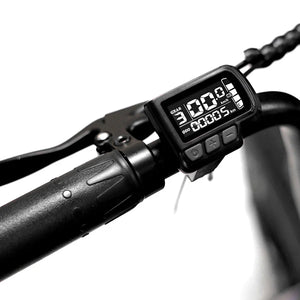 Chrome eBike Strike Big Boy electric bicycle, side view, showcasing large tires and sleek metallic frame