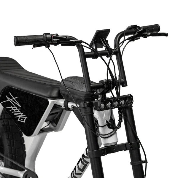 A black eBike Strike Rhino electric bicycle displayed from a side angle, showcasing its sturdy frame, thick tires, and integrated battery.