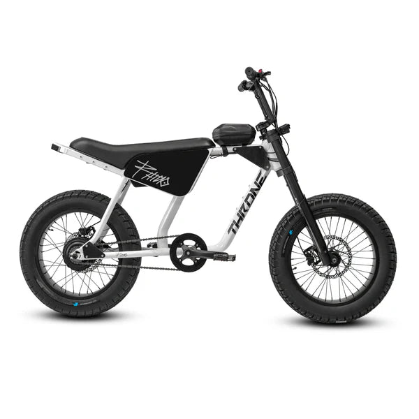 White eBike Strike Rhino model "Savage 1" side view, showcasing its sturdy frame, thick tires, and modern design against a plain background.