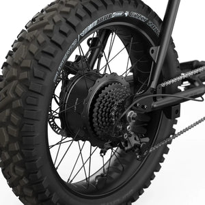 Side view of the Super73 Z Adventure Series SE electric bike in a rugged outdoor setting, showcasing its thick tires, sturdy frame, and adventure-ready design.