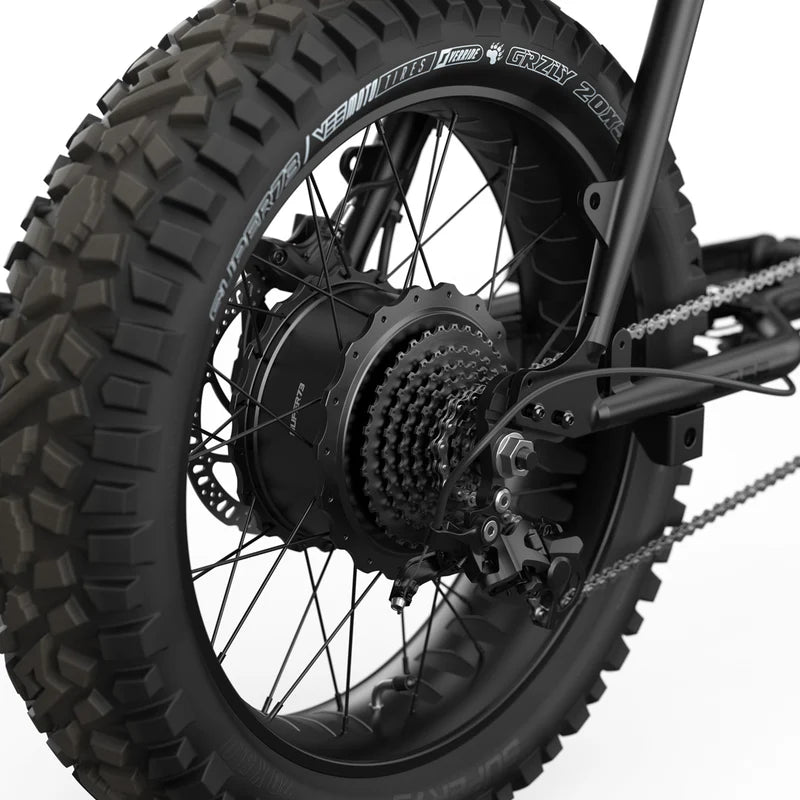 Side view of the Super73 Z Adventure Series SE electric bike in a rugged outdoor setting, showcasing its thick tires, sturdy frame, and adventure-ready design.