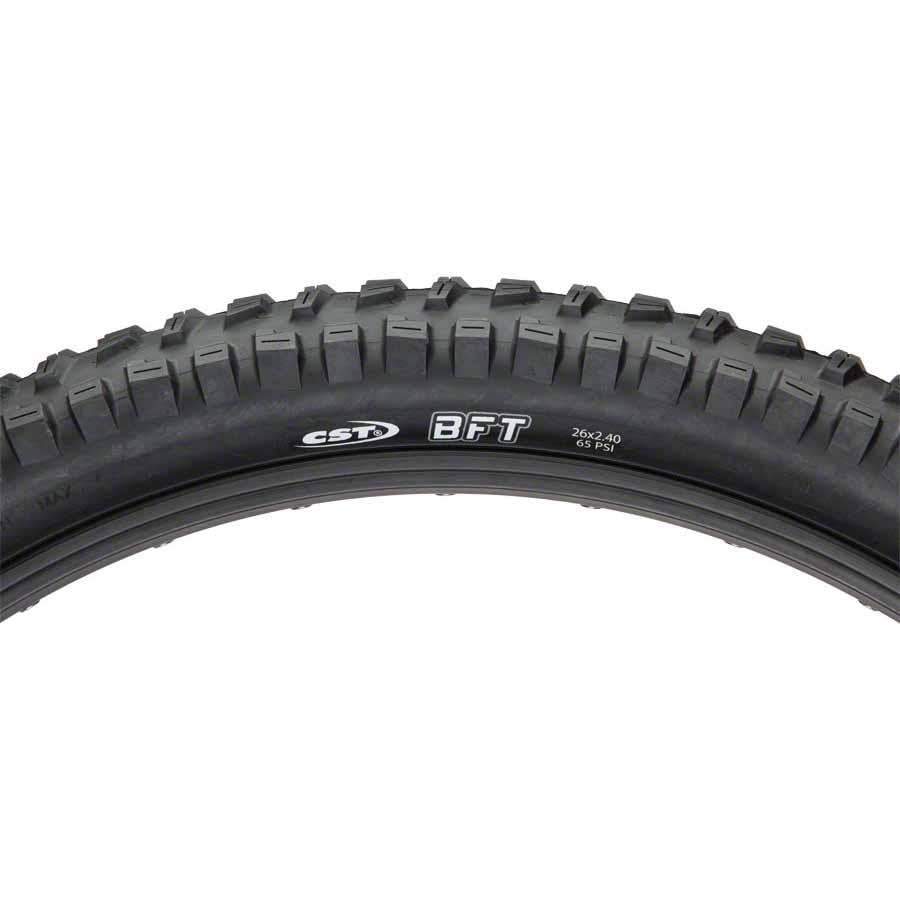 Side view of a 26x2.4 CST BFT eBike tire showing tread pattern and branding on the sidewall.