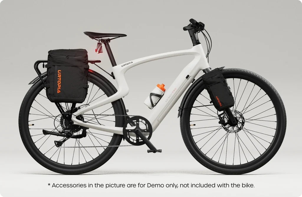 Side view of the Urtopia Carbon 1 Pro eBike in creme color, showcasing its lightweight carbon frame, integrated display, and sleek modern design against a plain background.