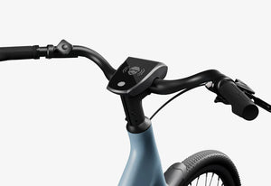 Urtopia Carbon 1 Step Thru eBike in Glacier Blue, side view highlighting the step-through frame and sleek design