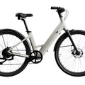 Urtopia Carbon 1 Step Thru eBike in creme color, side view, showcasing lightweight carbon frame and step-through design